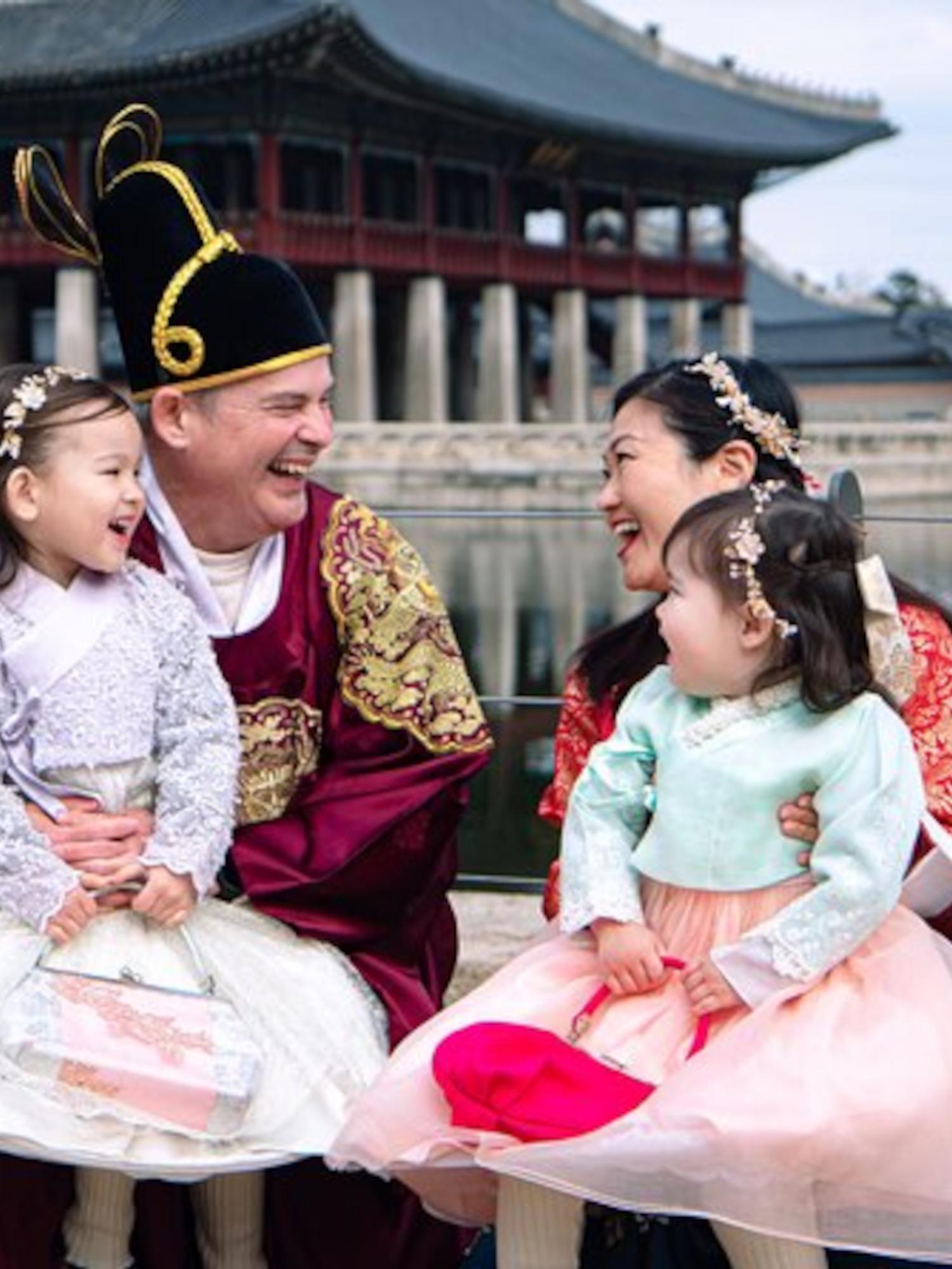Family exploring Gyeongbokgung Palace